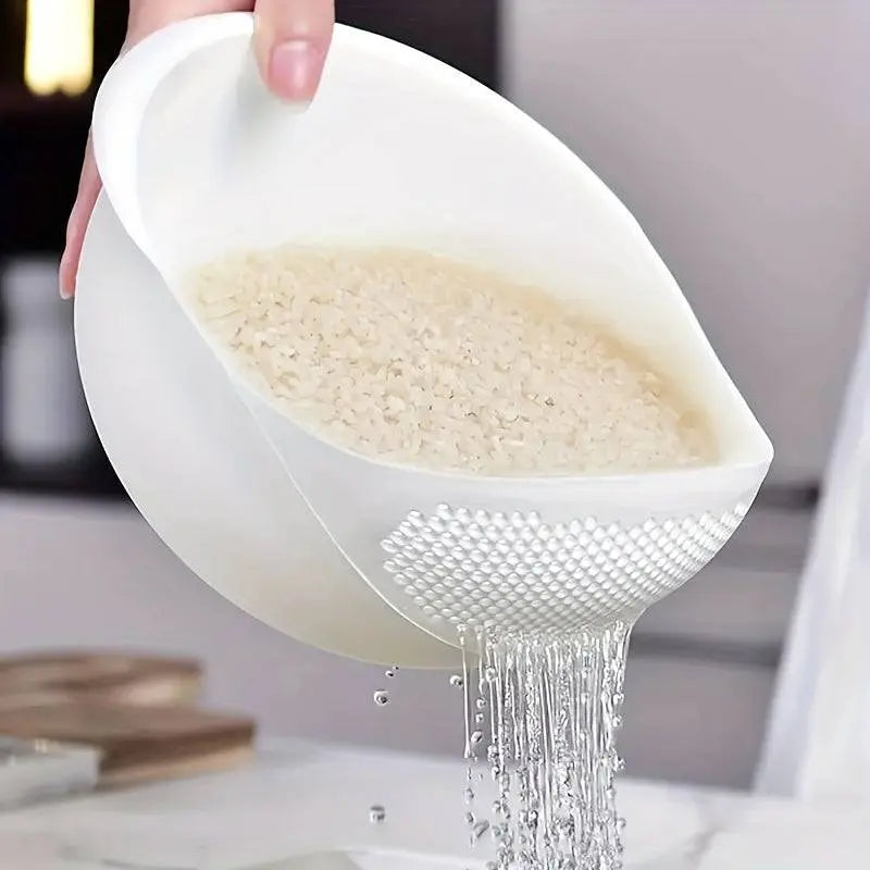 Silicone Colander Rice Bowl - Strain & Drain Efficiently draining soaked rice, highlighting its efficient design for kitchen use.