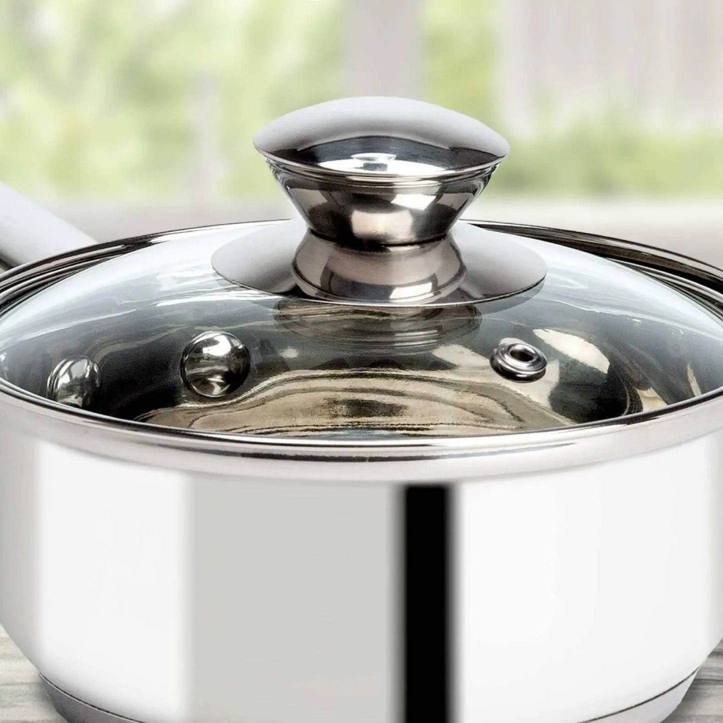 Durable Soup Pot - 316 Stainless Steel | Cookware close-up of polished pot with glass lid, highlighting premium quality and non-stick interior.
