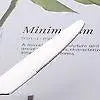 Detailed view of a knife blade from the 304 Stainless Steel Dinnerware Set - Timeless Dining, emphasizing its smooth, polished finish.