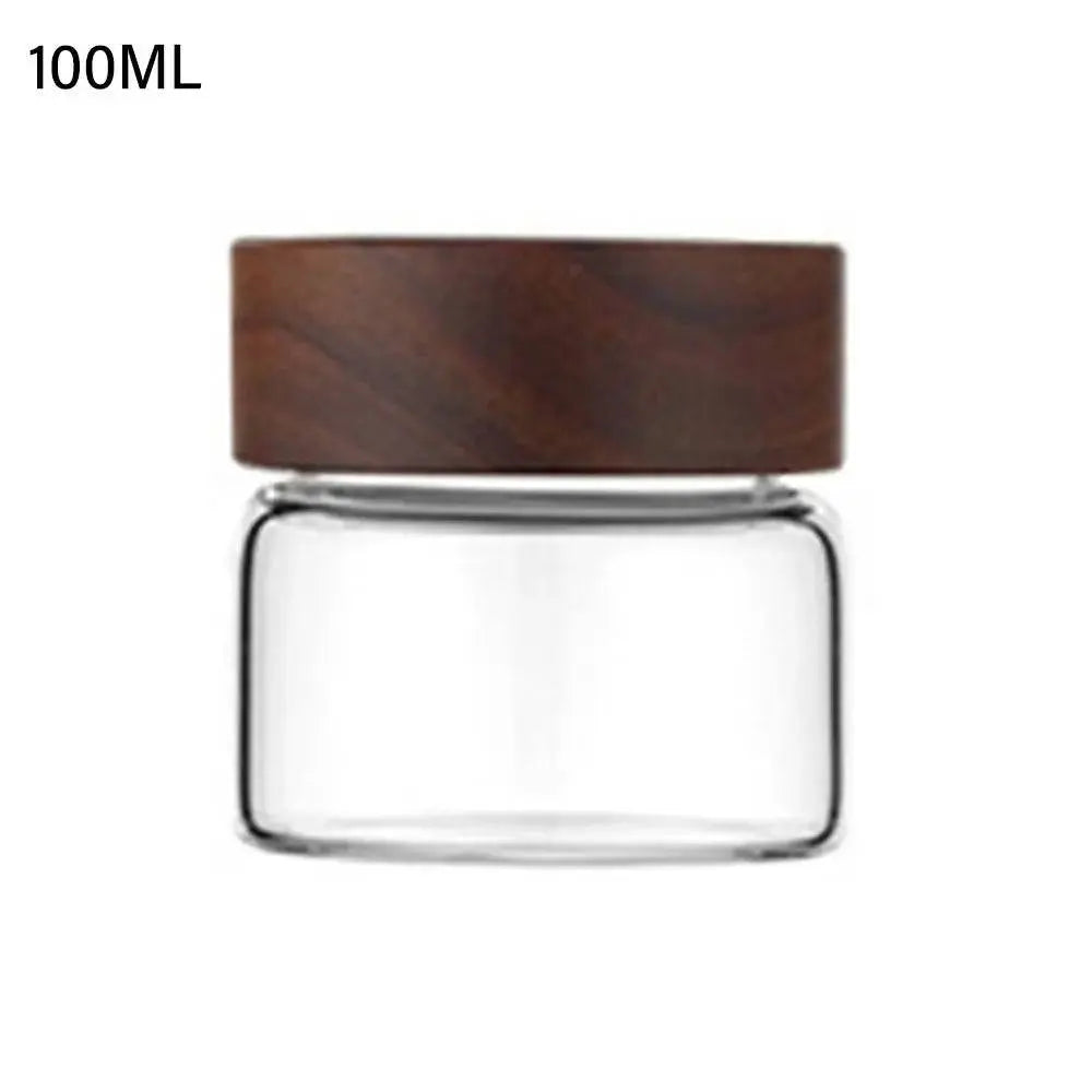 Glass Spice Jars with Wood Lids - Airtight Seal | Buy 2, Get 1 Free showing a compact 100ML glass spice jar with a thick acacia wood lid.