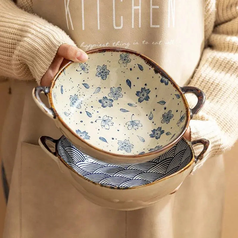 7.5-inch Japanese Noodle Bowl - Ceramic Masterpiece with blue floral and wave patterns, stacked and held for easy kitchen storage.