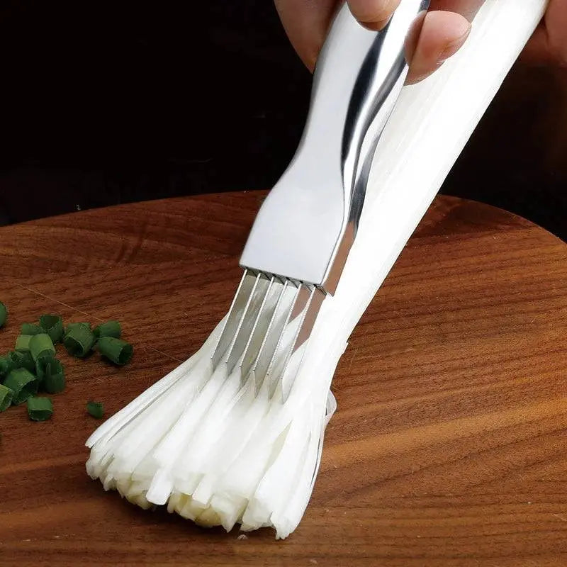 Stainless Steel Onion Cutter - Precision Grater | Quick Meal Prep tool finely shredding green onions on a wooden board for efficient cooking prep.