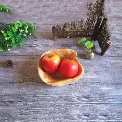 Compact Wooden Snack Bowl with two apples, emphasizing its handcrafted design for stylish snack organization or decorative use.