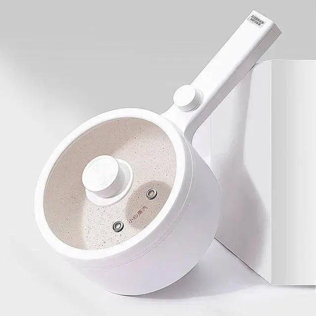 White Electric Hot Pot Cooker - Hassle-Free Cooking | Portable 1.5L featuring a sleek nonstick interior and ergonomic handle.