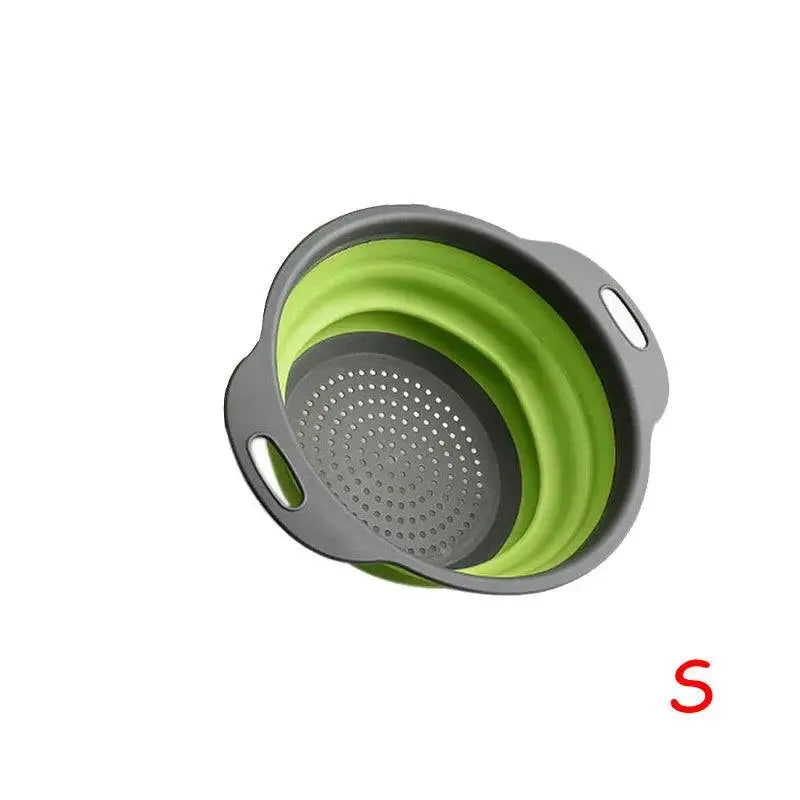 Small green Round Folding Colander with gray handles, perfect for compact kitchen storage and efficient food straining.