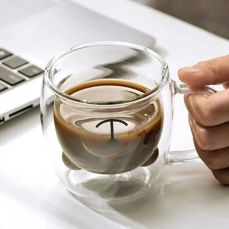 Borosilicate Glass Cup - Elevate Sipping | Spill-Resistant featuring a creative bear design filled with coffee, perfect for stylish hot beverages.