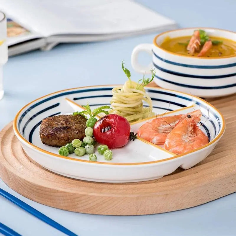 Ceramic Dinner Plate - Japanese Design | Portion Control in a striped blue pattern, used for neatly arranged seafood and vegetables.