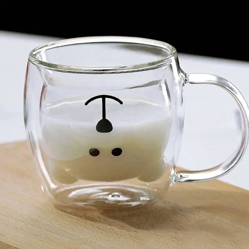 Borosilicate Glass Cup - Elevate Sipping | Spill-Resistant with a cute bear face design, filled with milk, ideal for cozy and elegant drink moments.