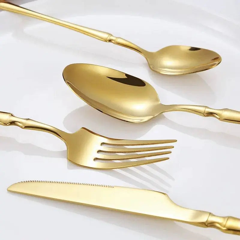 Close-up of 5/20/30 Pieces Cutlery - Gold Stainless Steel Set showcasing detailed craftsmanship of fork, knife, and spoons, ideal for luxury tablescapes.
