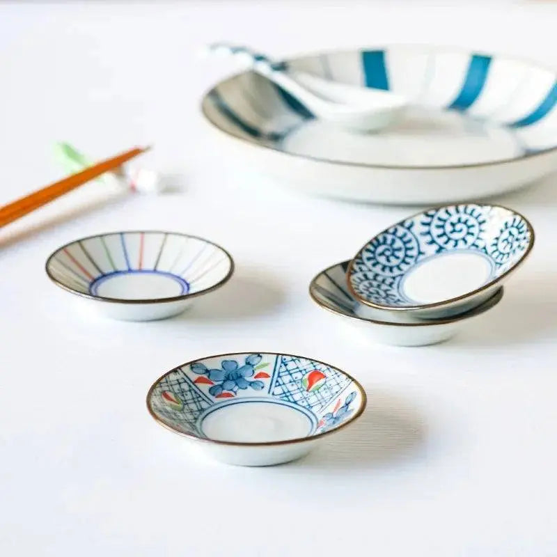 Stacked Japanese Ceramic Sauce Dishes with traditional patterns, perfect for serving sauces and elevating meal presentations.