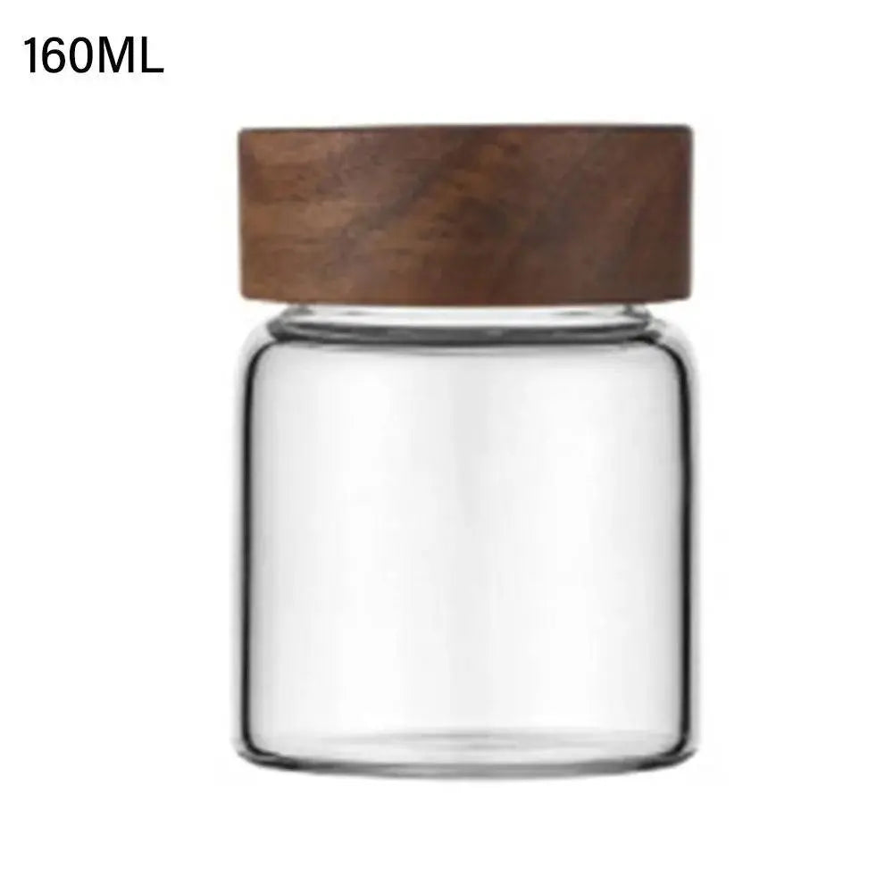 Glass Spice Jars with Wood Lids - Airtight Seal | Buy 2, Get 1 Free highlighting a 160ML glass spice jar with a natural wood lid for small spice storage.