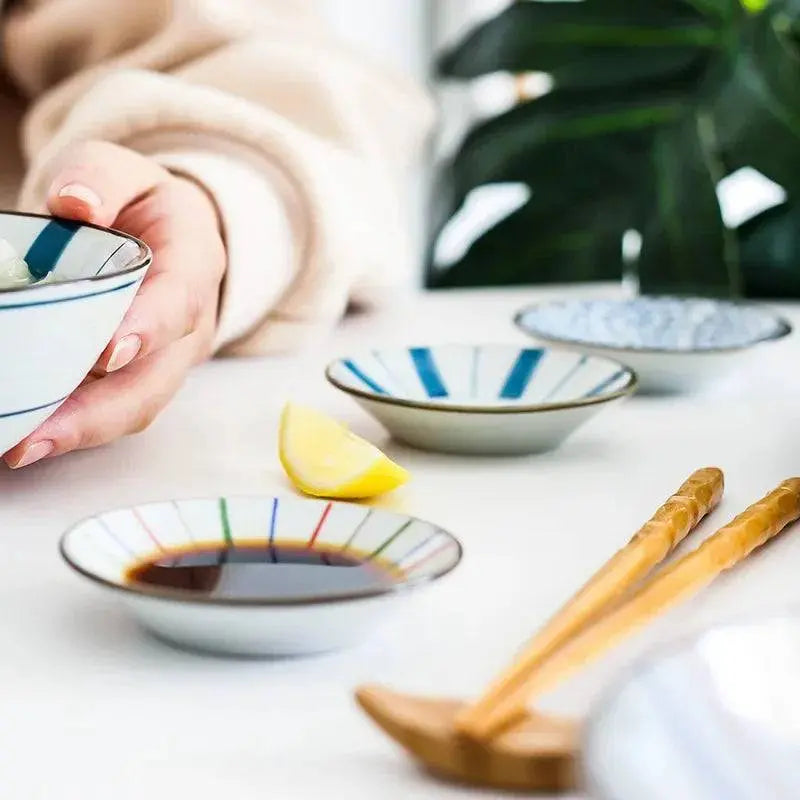 Ceramic Sauce Dish - Japanese Style featuring colorful patterns, ideal for serving sauces and gravies, enhancing elegant dining experiences.