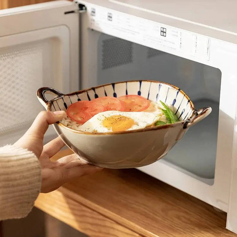7.5-inch Japanese Noodle Bowl - Ceramic Masterpiece shown microwave-safe, ideal for reheating noodle dishes with vegetables and eggs.