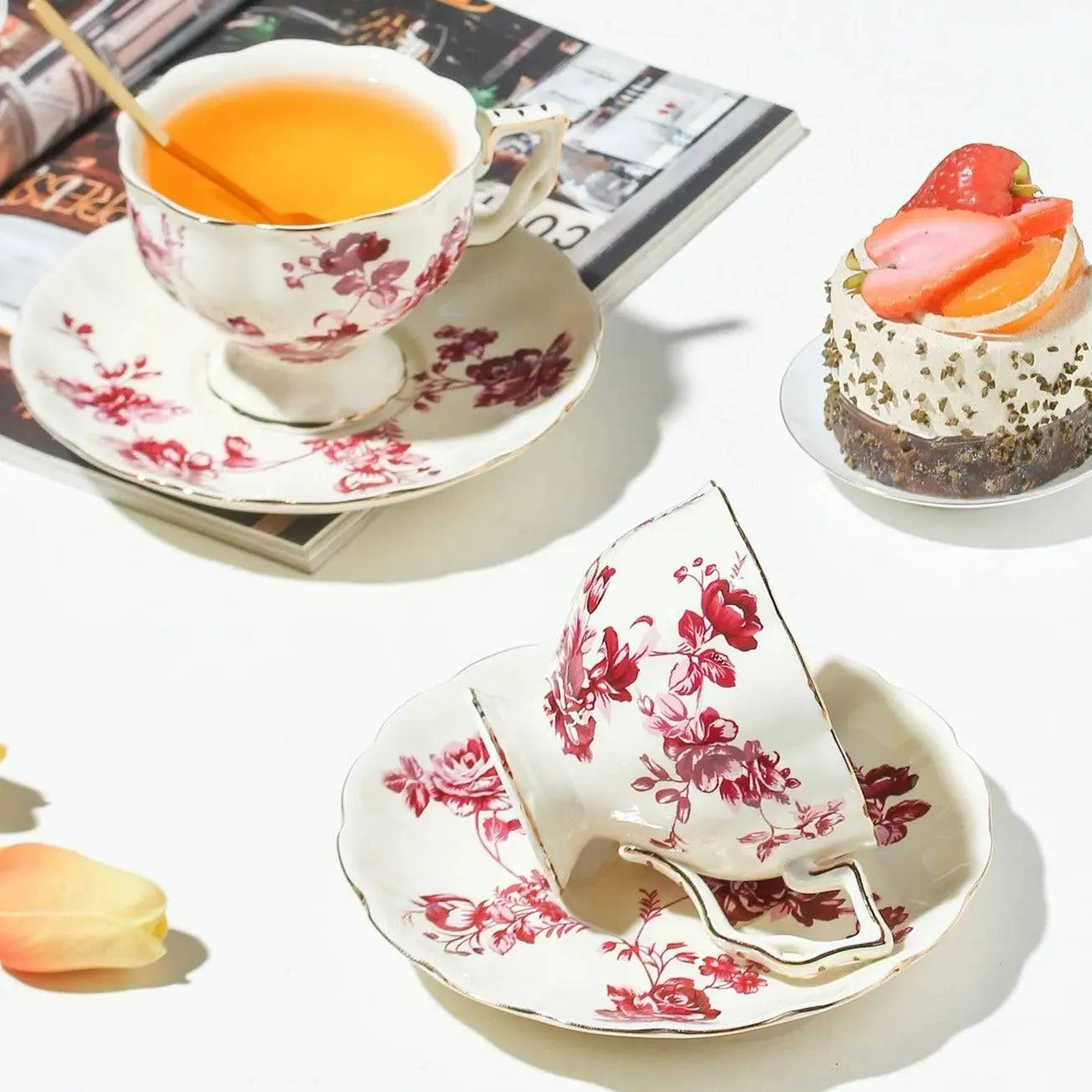 Red Flower Ceramic Coffee Set with floral cups and saucers, microwave safe, displayed with tea and cake for a cozy coffee experience.