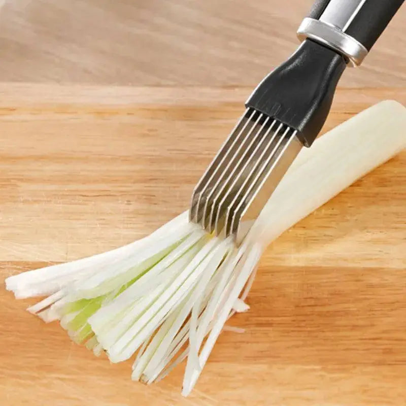 Stainless Steel Onion Cutter - Precision Grater | Quick Meal Prep tool shredding green onions finely on a wooden surface for easy meal preparation.