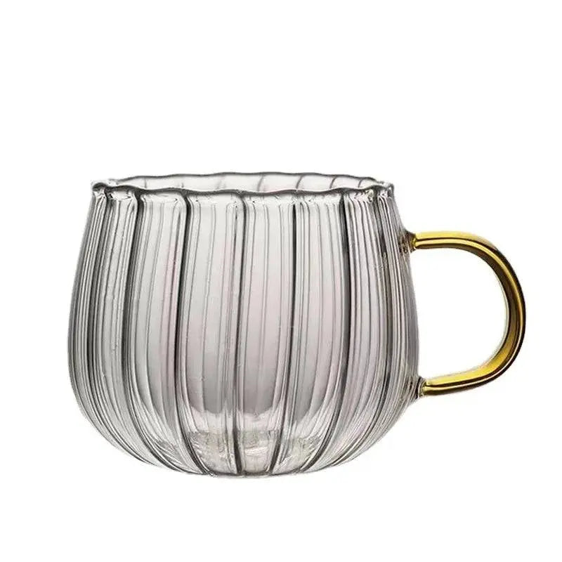 Heat-Resistant Striped Glass Mug with gold handle and ribbed design. Luxurious heat resistant glass mug for stylish drinkware collections.