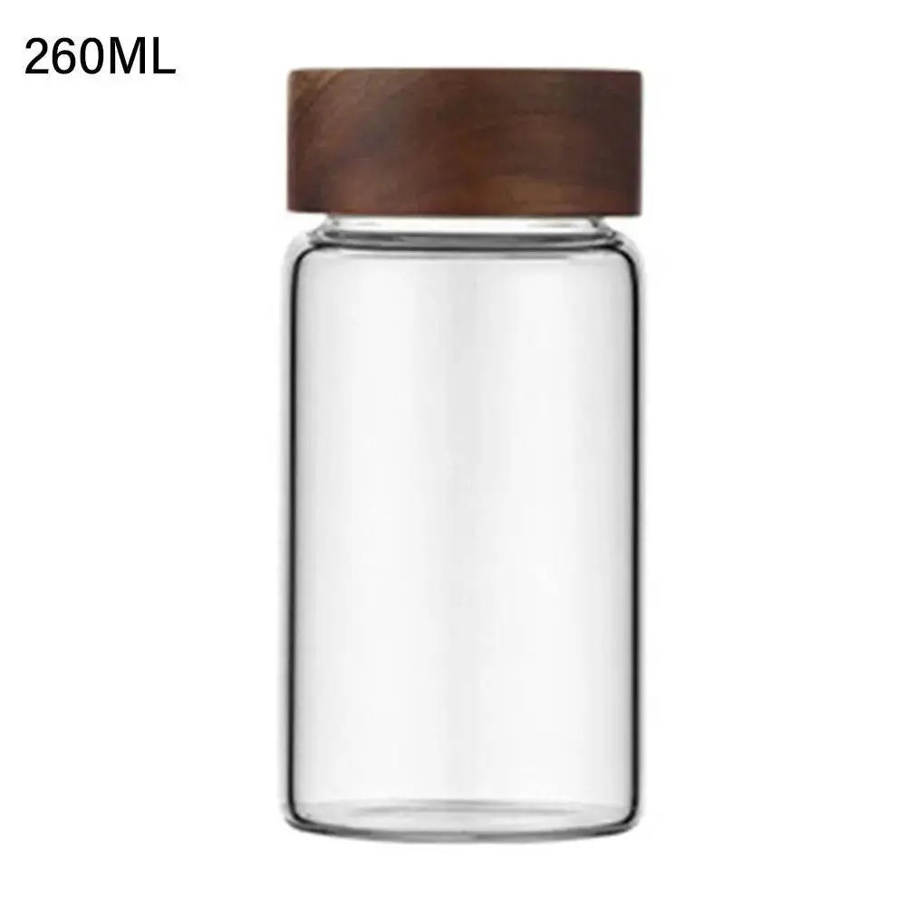 Glass Spice Jars with Wood Lids - Airtight Seal | Buy 2, Get 1 Free showcasing a 260ML clear glass spice jar with a smooth acacia wood lid.