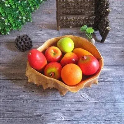 Rustic Wooden Snack Bowl with fruits, featuring a natural wood carving design, ideal for stylish kitchen organization and serving.