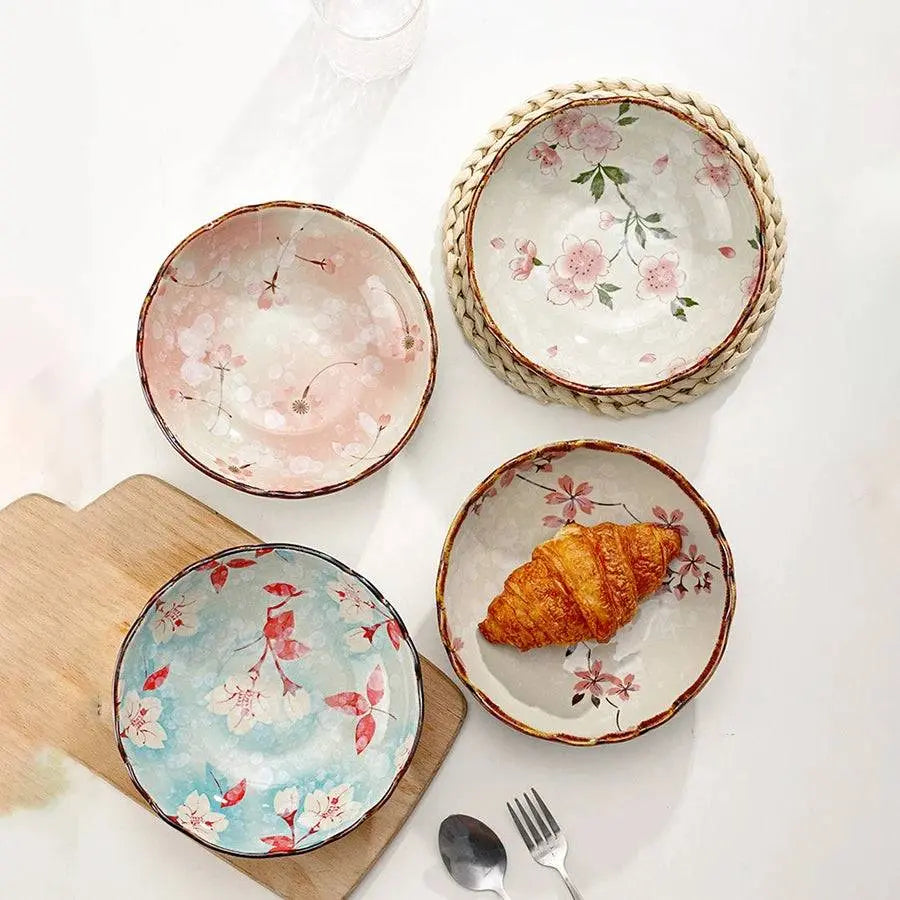 Set of 700 ML Flowers Ceramic Bowls in assorted floral patterns, ideal for stylish tableware and enhancing dining experiences.