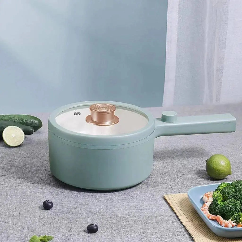 Electric Hot Pot Cooker - Hassle-Free Cooking | Portable 1.5L with lid closed, shown with fresh vegetables, perfect for easy meal prep.