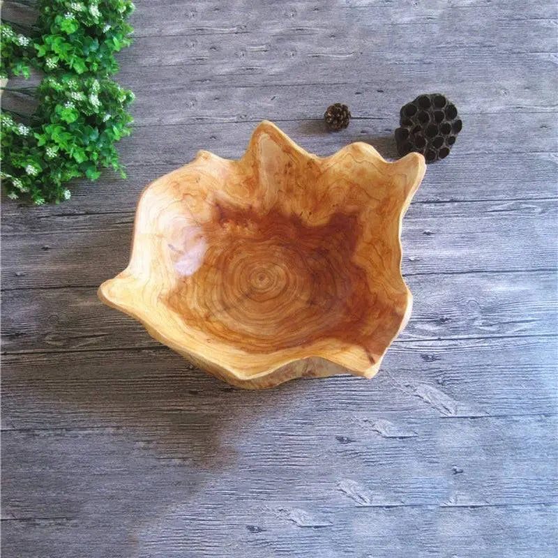 Single Wooden Snack Bowl with wavy edges and natural wood grain, ideal for decorative kitchen organization or serving snacks.