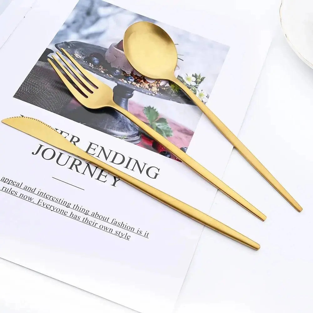 Stylish 16 Pieces Dinnerware Set showcasing matte gold knife, fork, and spoon on a fashion magazine backdrop, enhancing modern dining.