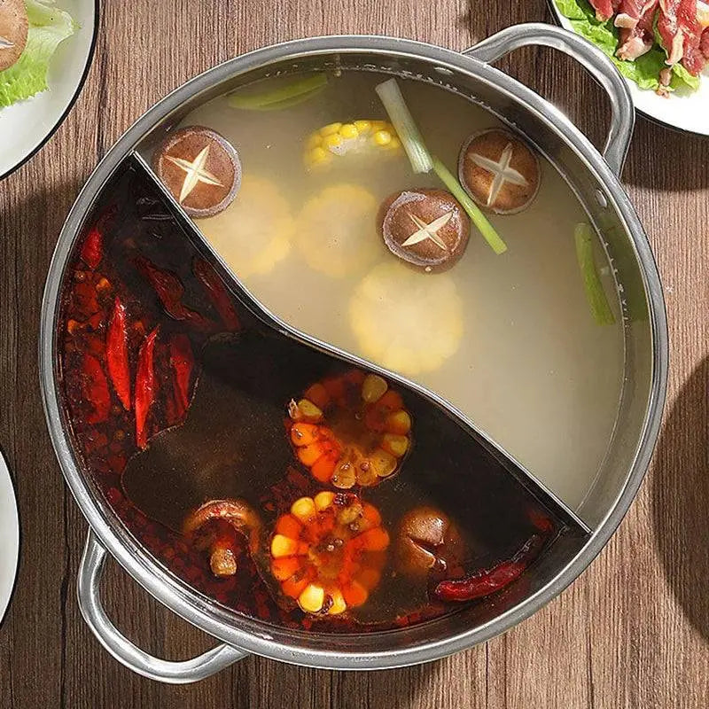 Chinese Hot Pot - Stainless Steel 2-in-1 Cooker featuring spicy and mild broths with corn, mushrooms, and peppers, ideal for flavorful meals.