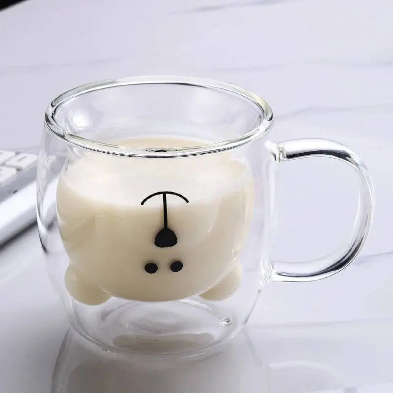 Borosilicate Glass Cup - Elevate Sipping | Spill-Resistant showcasing a bear-shaped inner wall filled with milk, combining fun and durability.