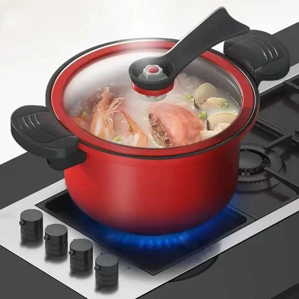 Red 3.5L Pressure Cooker boiling seafood soup on gas stove, non-stick and induction safe, ideal for quick and easy meals.