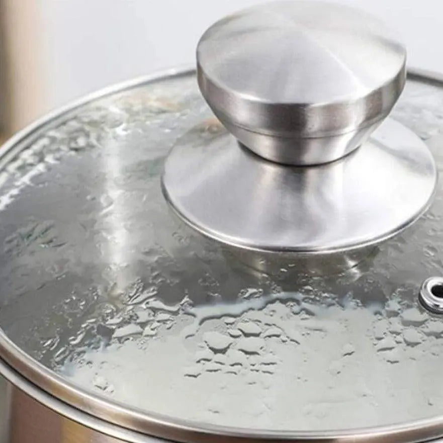 Durable Soup Pot - 316 Stainless Steel | Cookware featuring condensation on glass lid, showcasing excellent heat retention and steaming capability.