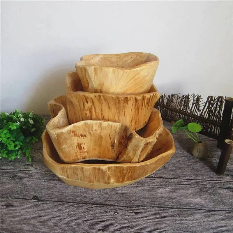Stacked Wooden Snack Bowls showcasing various unique designs and natural wood textures, perfect for stylish kitchen organization.