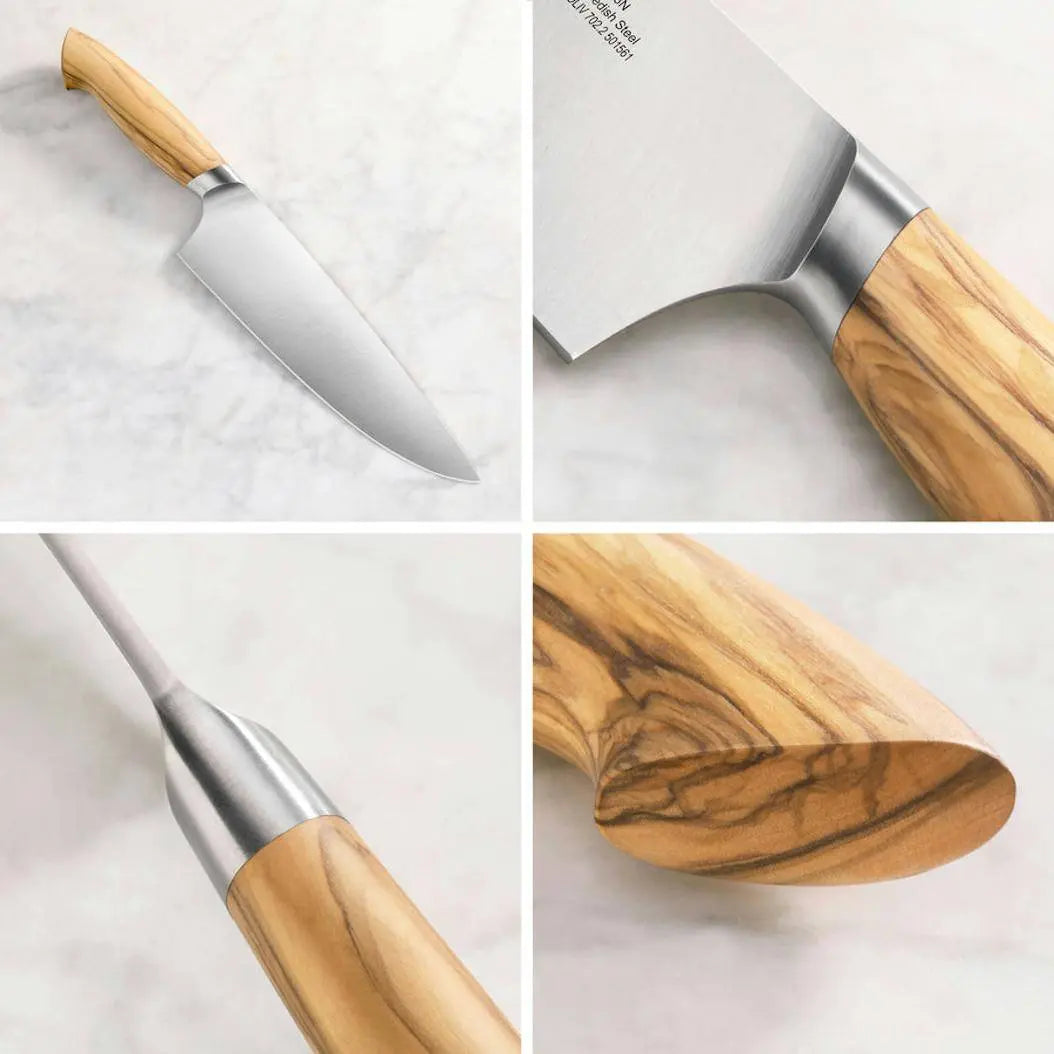 HEZHEN Knife Set - Sandvik Steel Knife Set close-up of chef knife details including blade, bolster, and olive wood handle, Buy 2 Get 1 Free.
