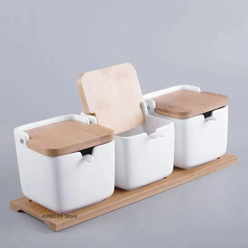 Minimalist Ceramic Spice Jar with Bamboo Lid | Compact & Airtight three white spice jars with bamboo lids arranged neatly on a bamboo tray.