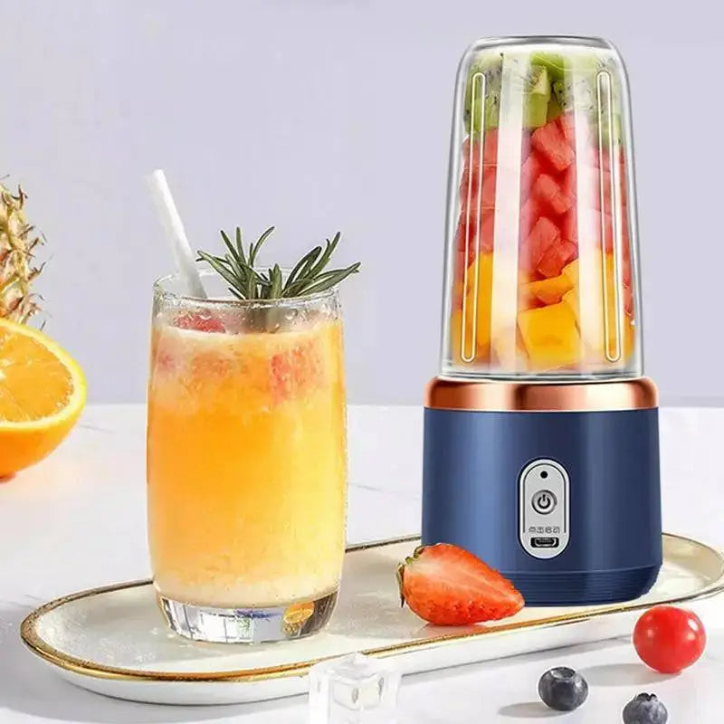 Portable Electric Juicer - Fresh Smoothies On-The-Go in navy blue with a glass of orange smoothie, ideal for health-focused users.