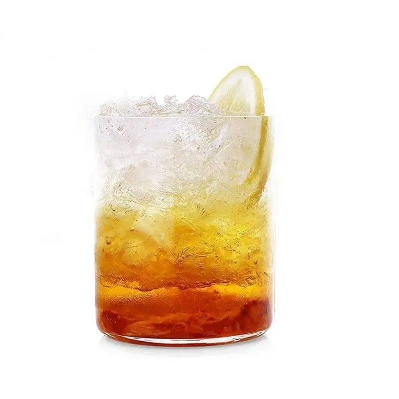 BPA-Free Borosilicate Glasses Set - Durable, Stylish featuring a single glass with layered iced drink and lemon slice, showcasing stylish design.