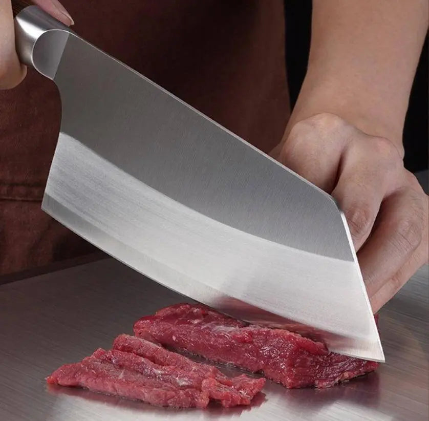 Ladies Cutting Knife - Kitchen Essential slicing raw meat with ease; precision stainless steel blade designed for versatile kitchen use.