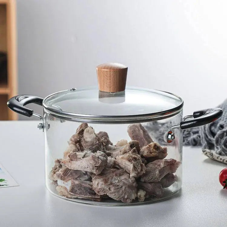 Transparent Glass Soup Pot - Heat-Resistant Cookware containing cooked meat pieces, ideal for preparing hearty soups and stews.