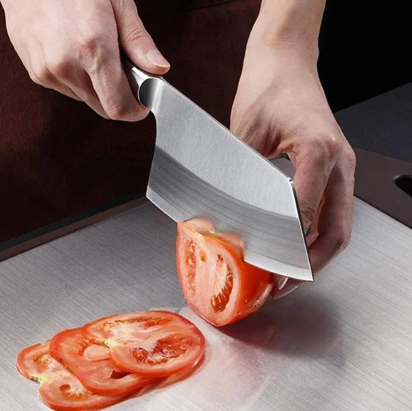 Ladies Cutting Knife - Kitchen Essential used for slicing tomatoes with precision; stainless steel blade ideal for culinary tasks.