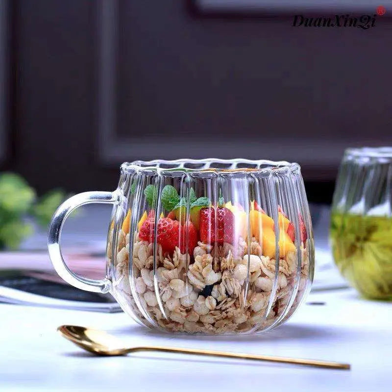 Heat-Resistant Striped Glass Mug filled with granola and fruits on a white tray. Stylish heat resistant glass mug for versatile use.