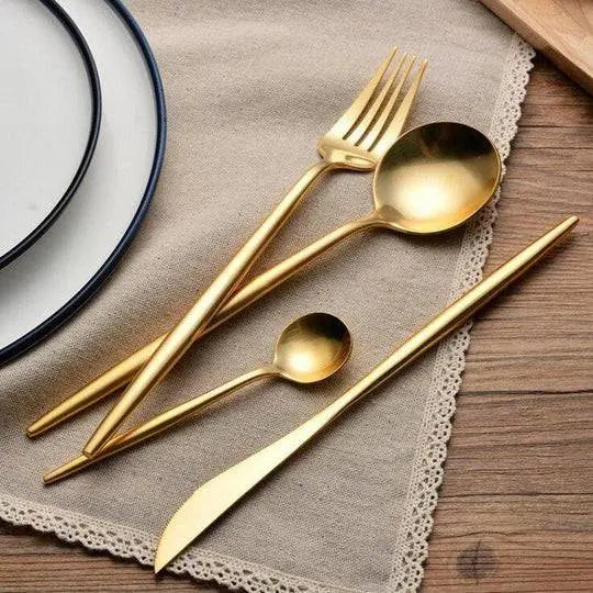 Elegant 16 Pieces Dinnerware Set featuring matte gold stainless steel cutlery on a rustic table setting, perfect for upscale dining.