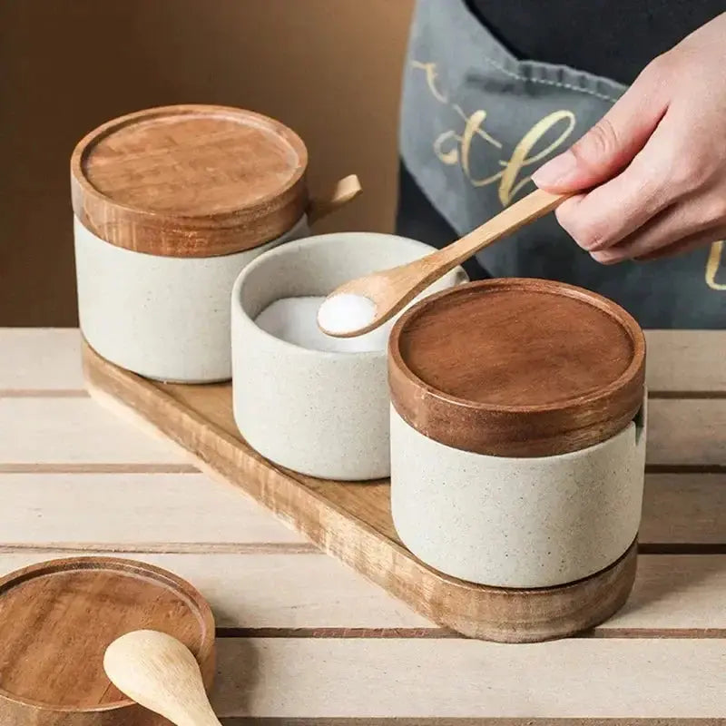 Ceramic Retro Seasoning Jar with Wooden Lid set on a wooden tray, ideal for airtight storage of herbs and spices with a rustic countertop charm.