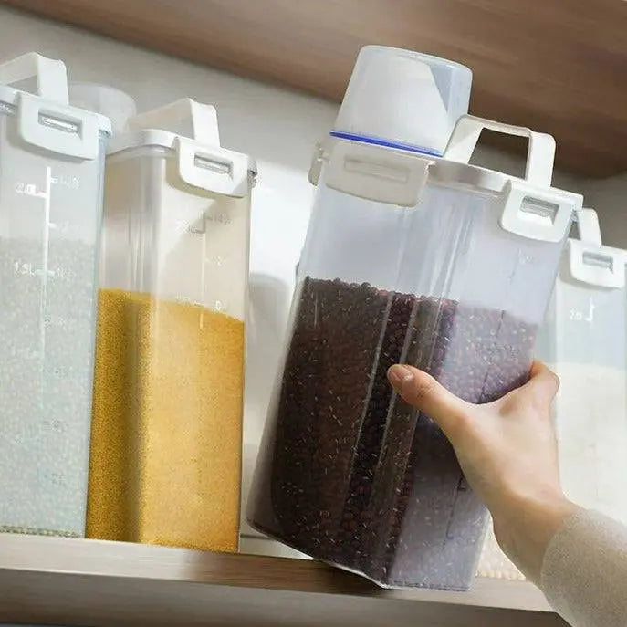 Large Capacity Food Storage Dispenser with Airtight Seal being retrieved from a shelf, filled with beans, perfect for organized kitchen storage.
