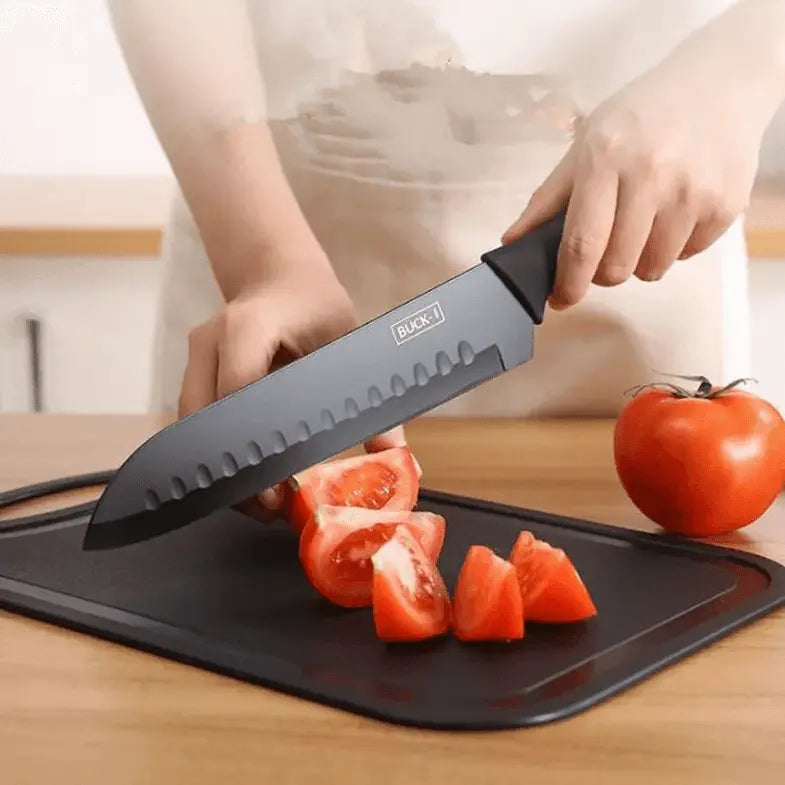 8 Pieces Knife Set - 8 Piece Knife Set | Razor-Sharp Knives Combo featuring a black chef knife slicing tomatoes on a black chopping board, ideal for meal prep.