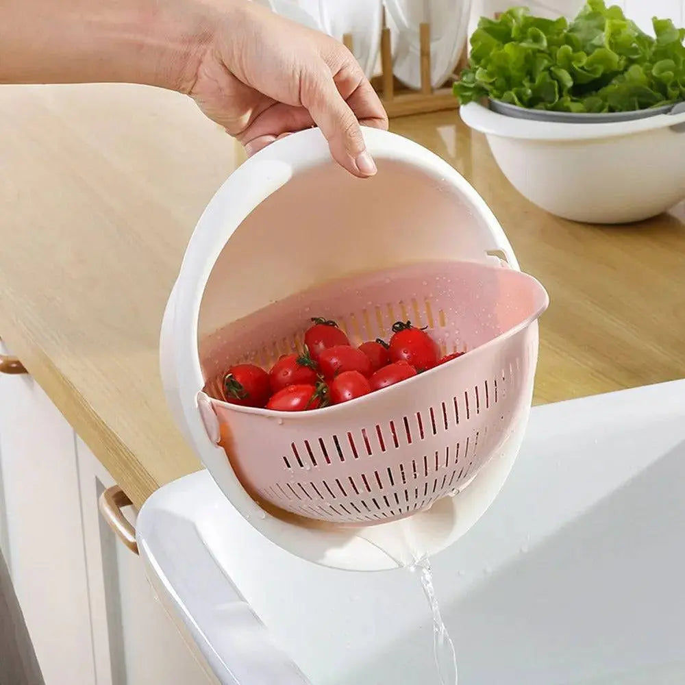 Rotatable Double Drain Basket - Efficient Kitchen Tool draining water from washed tomatoes, showcasing easy kitchen use.