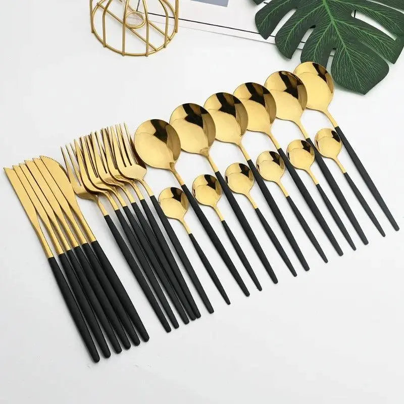 24 Pcs Black Handle Golden Cutlery Set featuring stainless steel knives, forks, and spoons with elegant black handles and shiny gold heads.