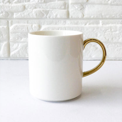 Elegant Coffee Cup with Gold Handle